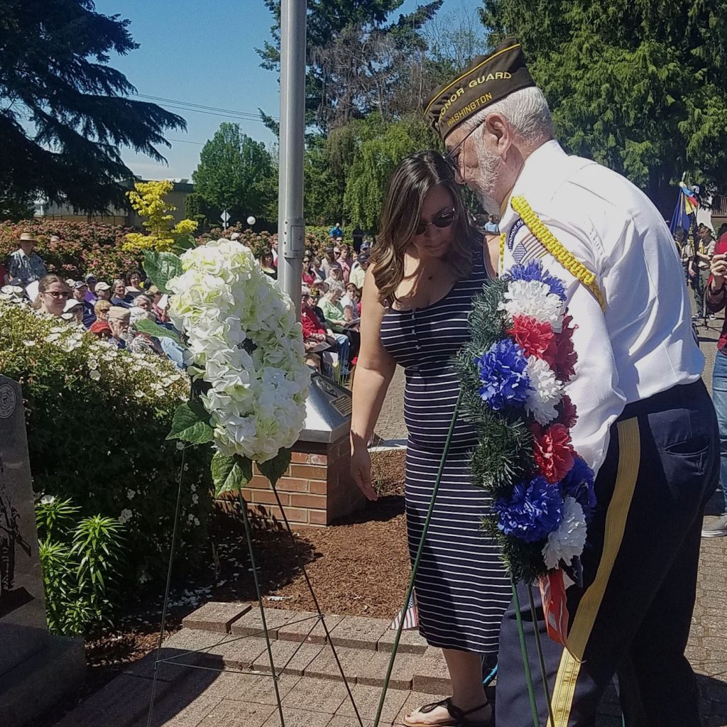 Tiarrah Rintamaki, sister of US Marine Corps Corporal Stephen Rintmaki, laying the Gold Star Wreath.