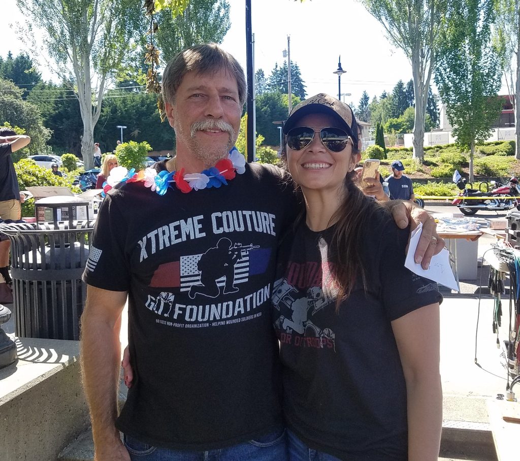 Lynnwood Times photo by Mario Lotmore. Patrick Crosby and his wife Julieta Altamirano-Crosby at the Xtreme Couture Poker Run on June 15.