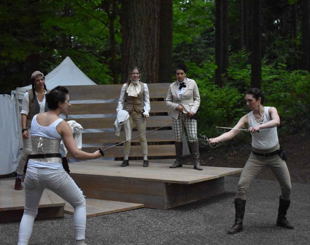 Lynnwood Times photo by Luke Putvin. Jonelle Jordan as Mercutio (Left) and Shanna Allman as Tybalt (left) at Lynndale Park for the July 17 performance of Romeo and Juliet by Seattle Shakespeare Company. 