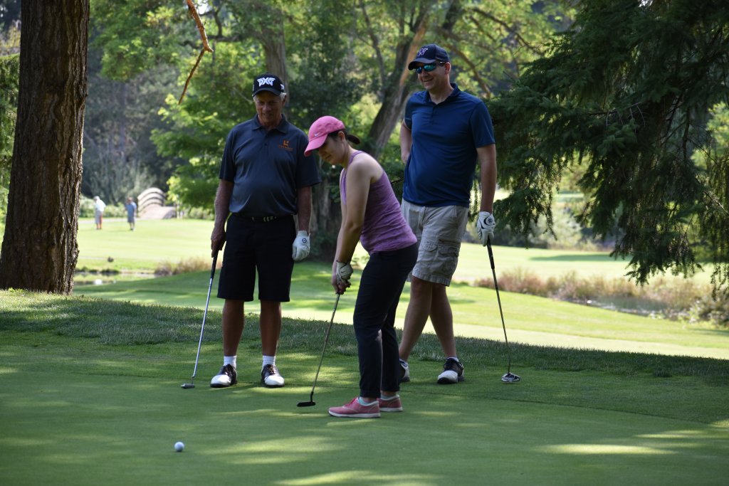 Lynnwood Times photo by Luke Putvin. Pictured L-R: Lynn Sordel, Ashley Winchell and Todd Hall at Par 4 Kids on August 2.