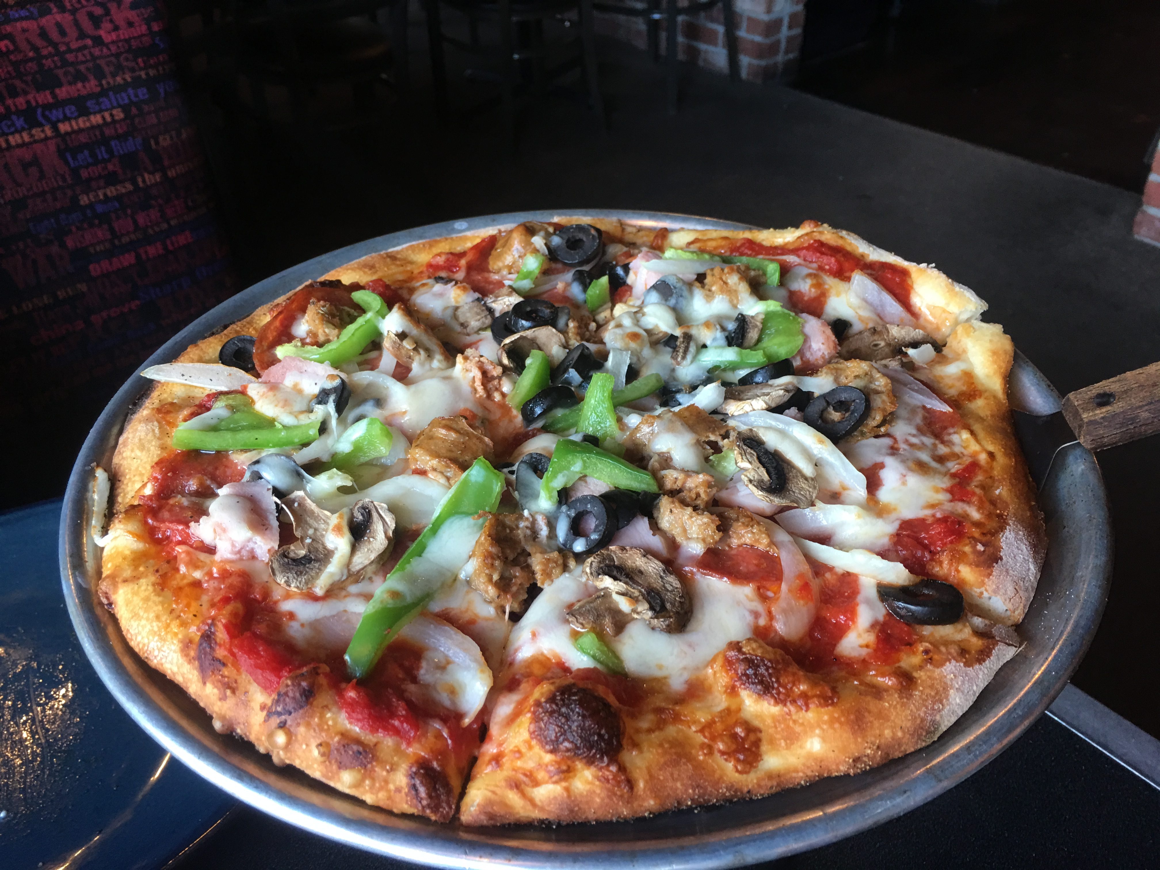 Happy hour: The Rock Wood Fired Pizza Wood Village 
