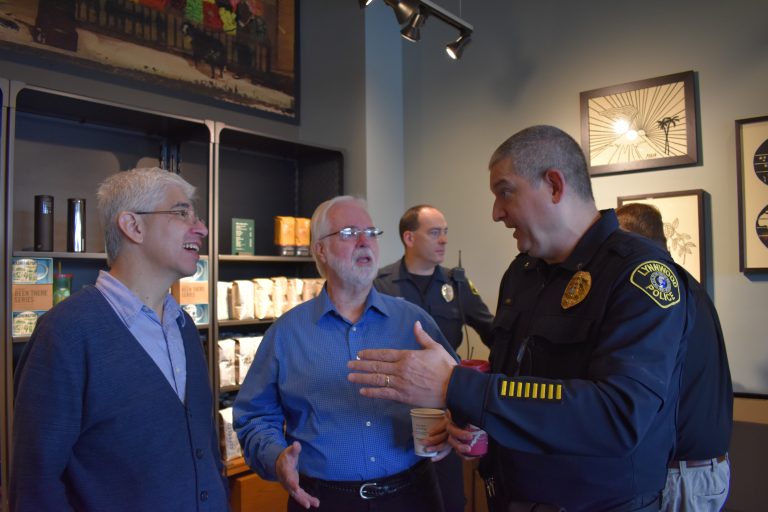 Lynnwood Starbucks astor Hector Garfias-Toledo from Trinity Lutheran, Jim Smith, and Sgt. Sean Doty.