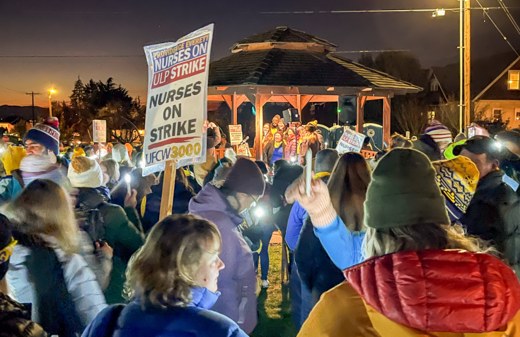 Ferguson, Robinson join Providence nurses strike, speak at candlelight