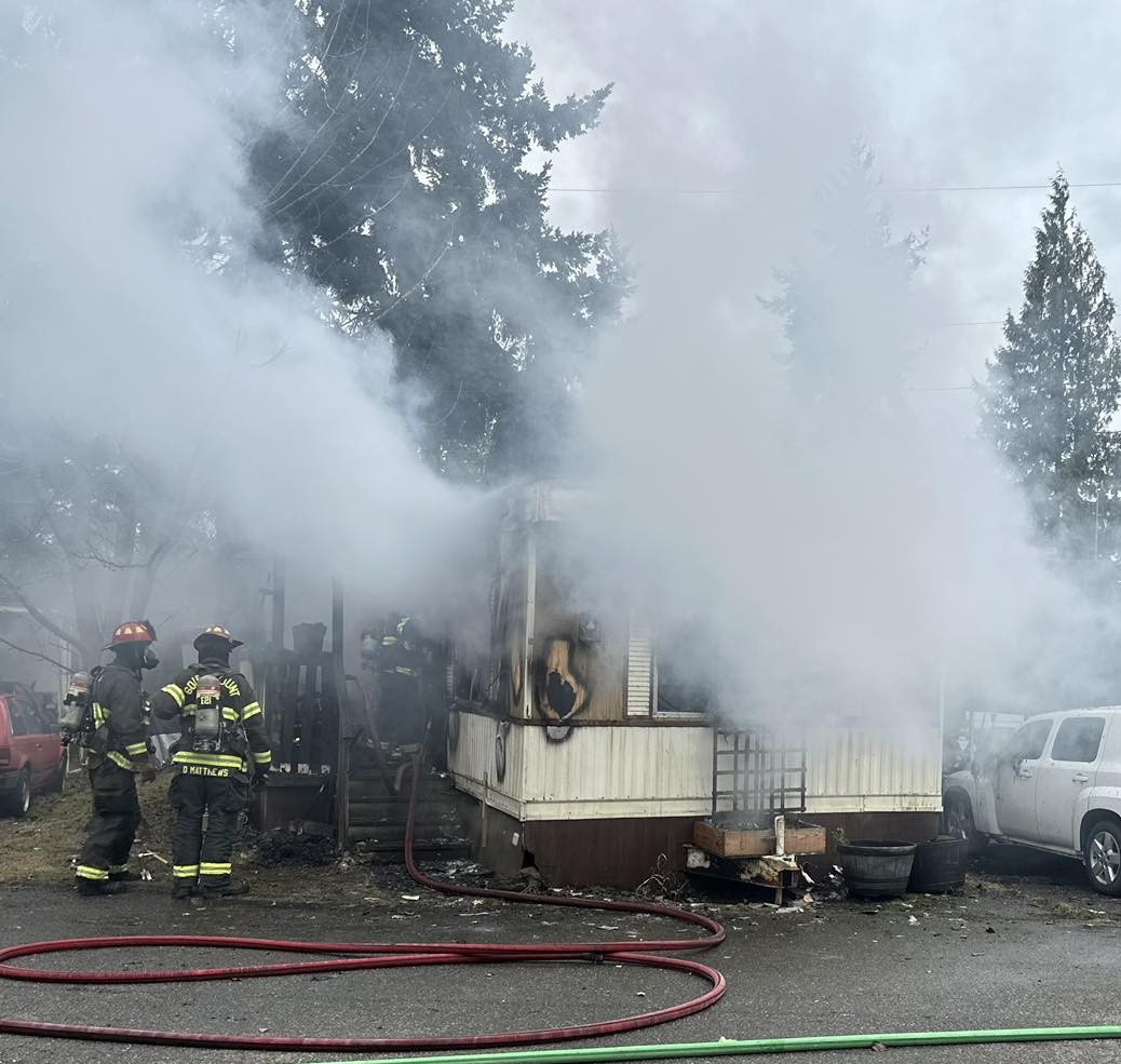 Firefighters transport man to hospital as fire destroys mobile home ...